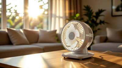 Elektrische ventilator in een Nederlandse woonkamer tijdens hittegolf zomer 2026