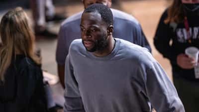 Draymond Green on court during NBA game with Warriors 2026
