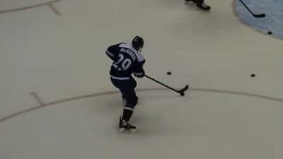 Nathan MacKinnon warming up on ice during Colorado Avalanche practice