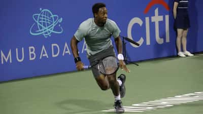 Gaël Monfils serving during the 2023 DC Open tennis tournament