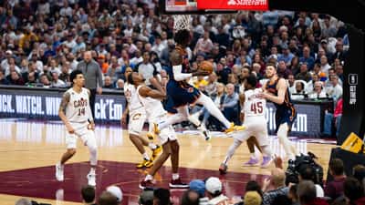 Basketball players in action during a New York Knicks NBA playoff game
