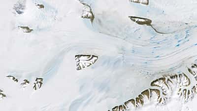 Meltwater ponds on the Antarctic Amery Ice Shelf photographed by NASA, illustrating accelerating ice loss in 2026