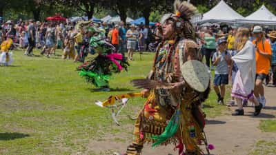 First Nations dancers in traditional regalia at a powwow festival in Toronto, Canada
