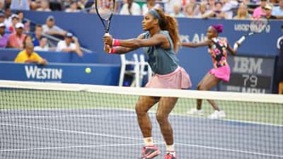 Venus Williams and Serena Williams at professional tennis event