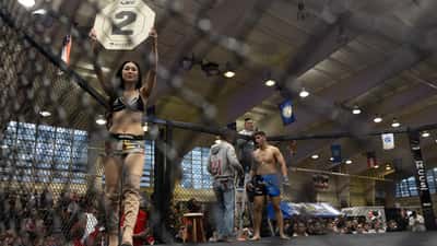 MMA fighters competing during a fight night event