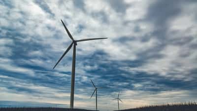 Wind turbines at a large-scale renewable energy wind farm under open sky