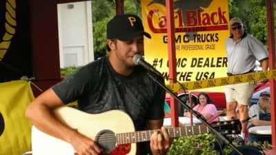 Country musician Luke Bryan representing the farm tour and agricultural family estate planning