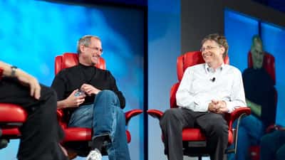 Bill Gates and Steve Jobs in conversation at a tech event