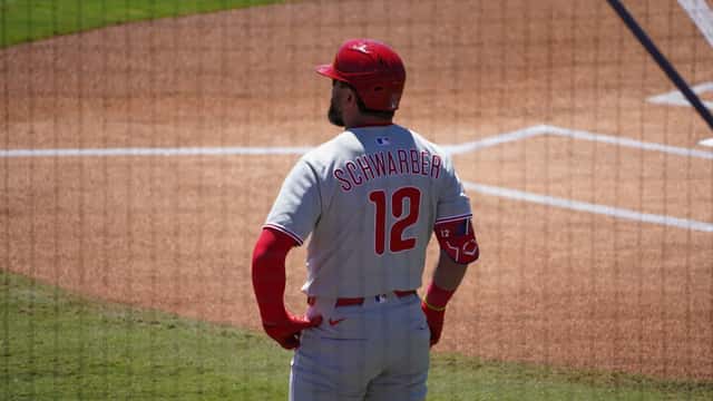 Kyle Schwarber batting in Philadelphia Phillies uniform at spring training, Dunedin Florida