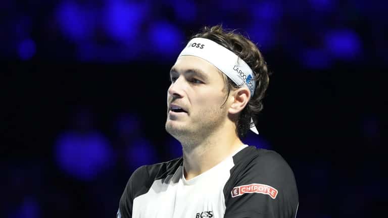 Taylor Fritz competing at an ATP grass court tournament in 2025