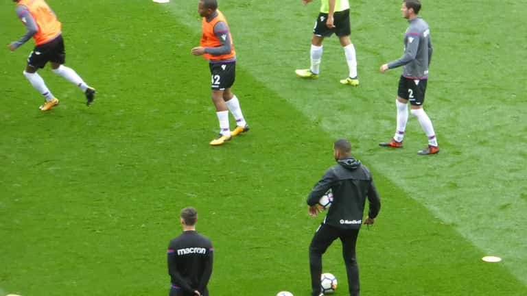 Crystal Palace players competing in a Premier League match