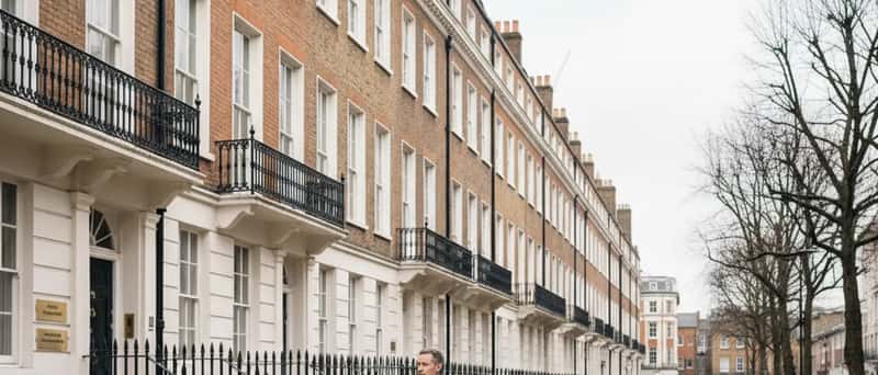 Professional offices on a British high street with brass plaques for accountancy firms