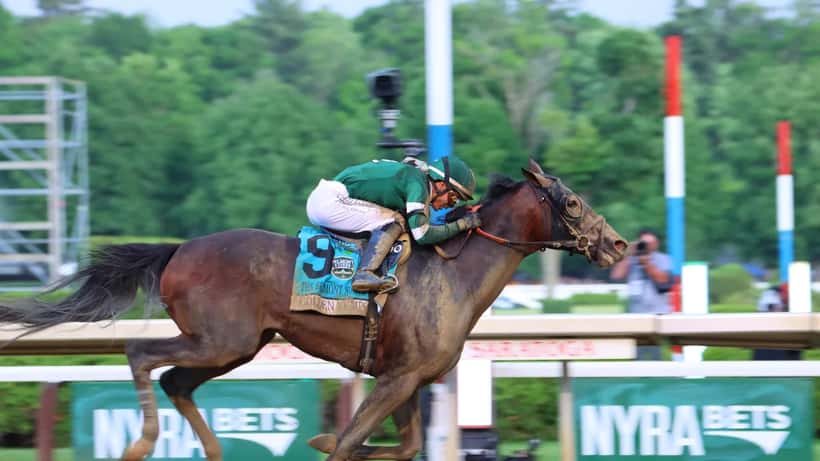Golden Tempo at the 2026 Belmont Stakes finish line, racing to victory
