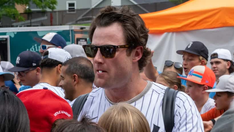 Gerrit Cole pitching for the New York Yankees, representing MLB guaranteed contracts and athlete legal rights