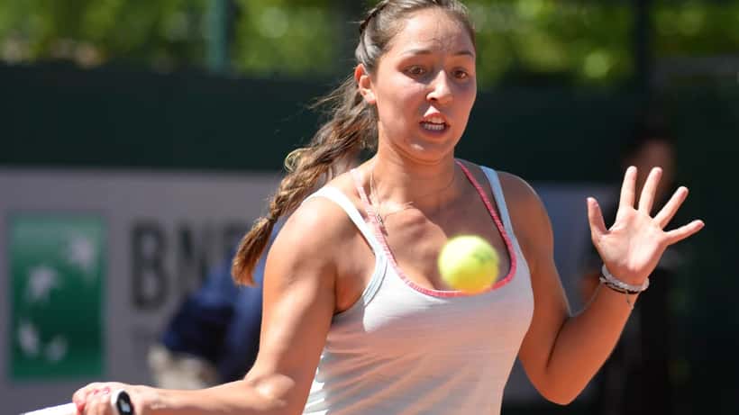 Jessica Pegula in action at a 2026 WTA tournament, preparing to serve on hard court