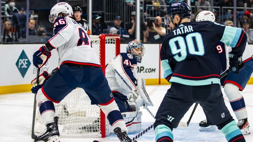 Kirill Marchenko in Columbus Blue Jackets uniform during NHL game action