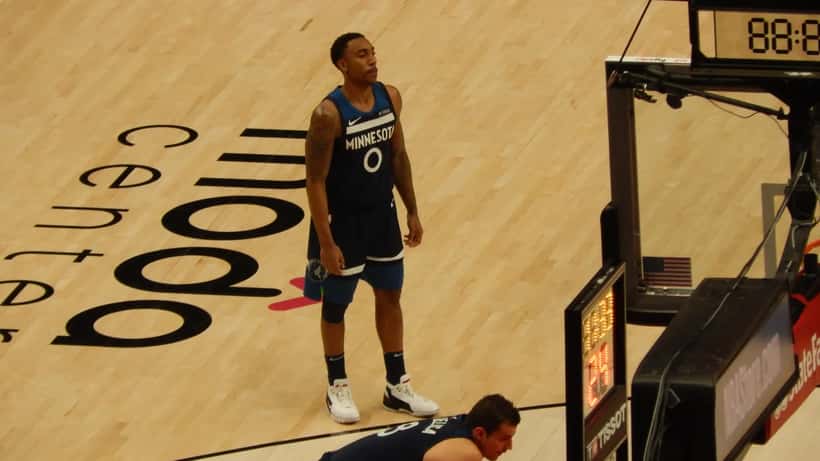 Joueur de basketball des Minnesota Timberwolves en action lors d'un match NBA