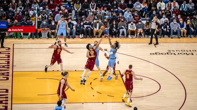 Ja Morant in his Memphis Grizzlies uniform dribbling the basketball on the court
