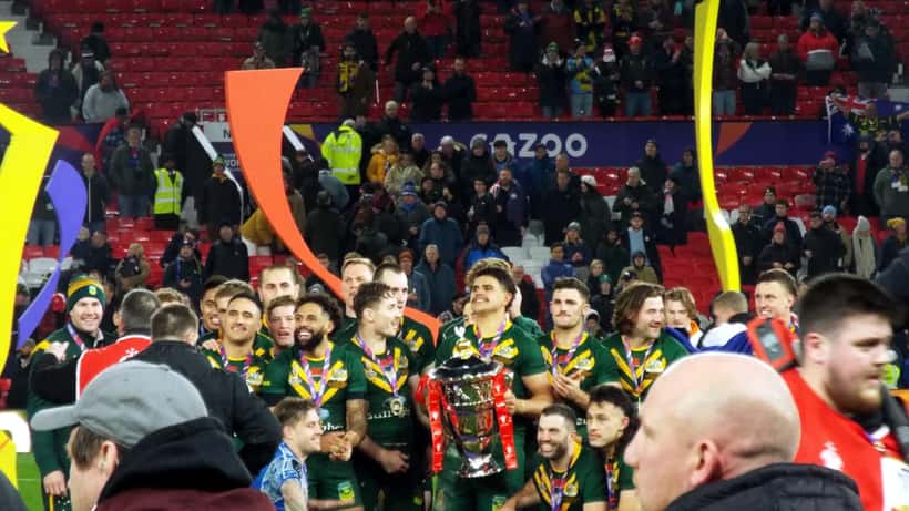 Australian rugby league players celebrating at the 2021 Rugby League World Cup