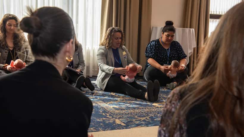 Childcare educators in a professional development workshop