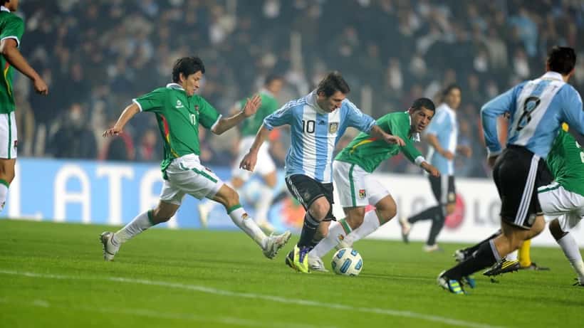 Argentina vs Bolivia football players competing during international friendly match
