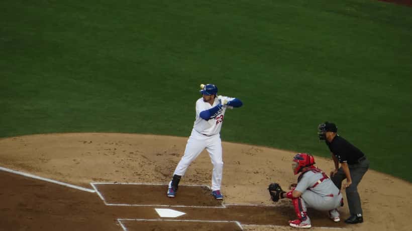 St. Louis Cardinals MLB players in action at a professional baseball stadium