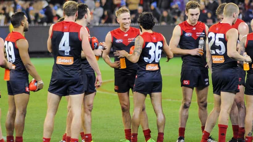 Melbourne AFL players celebrating a win, representing Zane Duursma's new club
