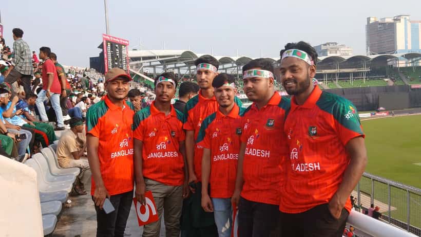 Spectators at a Bangladesh cricket match in a packed stadium, showing the scale of international cricket audiences and player incentives