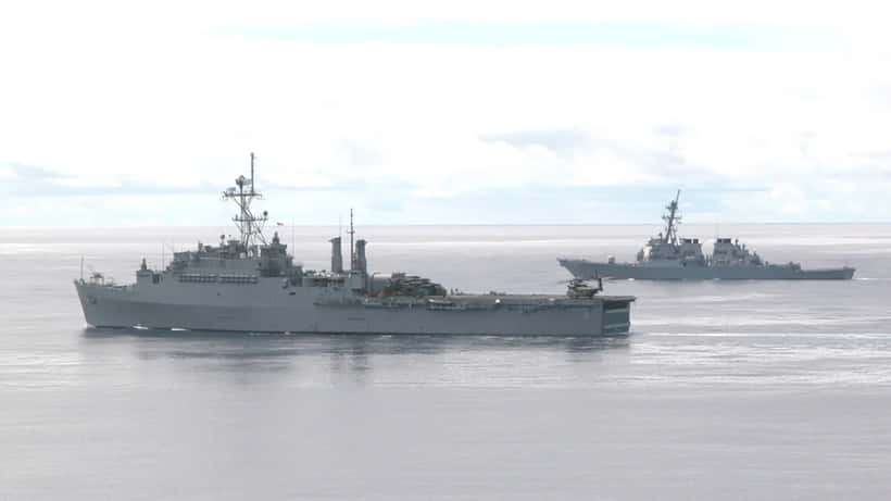 Two US Navy guided missile destroyers operating underway at sea