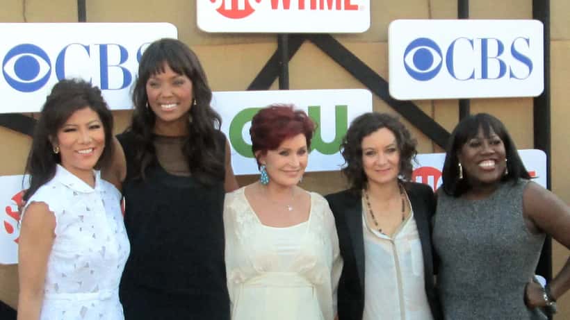 Sharon Osbourne at a public event in 2012, surrounded by other television personalities