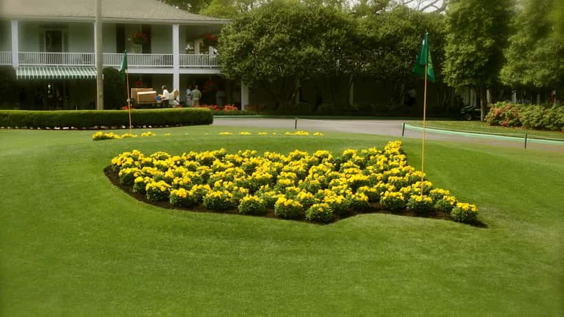 Augusta National Golf Club with Masters Tournament logo and flowers at Augusta, Georgia