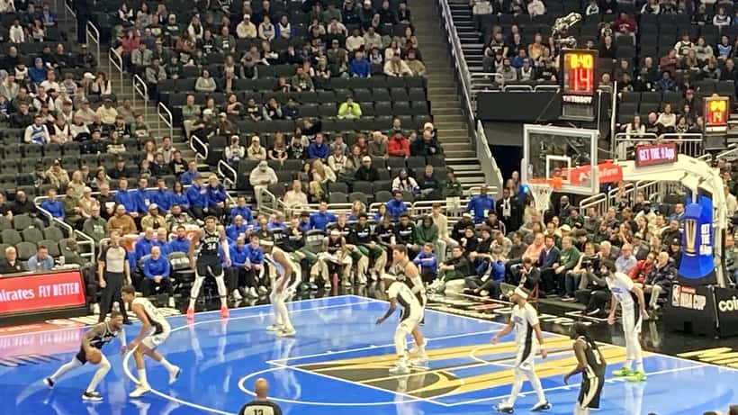 Orlando Magic players in warm-up at Kia Center arena, December 2024 NBA regular season action