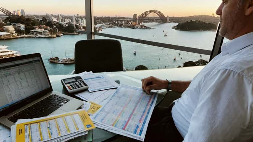 Financial adviser reviewing investment plans in a Sydney office