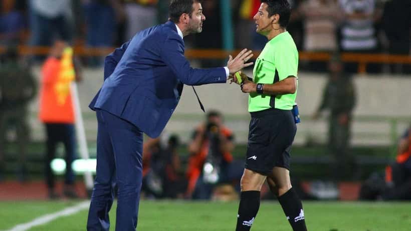 Alireza Faghani officiating a football match as FIFA World Cup 2026 referee