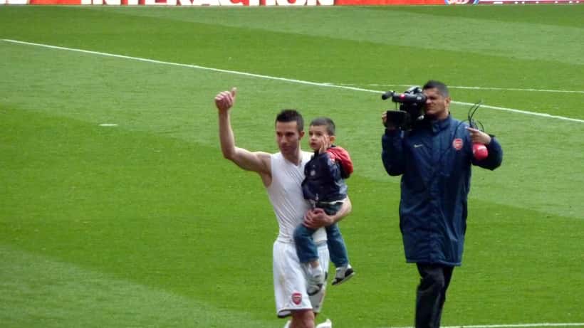 Robin van Persie met zijn jonge zoon Shaqueel