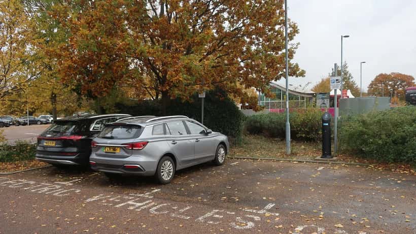 Electric car charging point in the UK, showing EV infrastructure and running costs