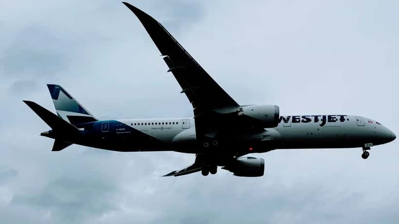 WestJet Boeing 787 Dreamliner airplane on tarmac at Canadian airport