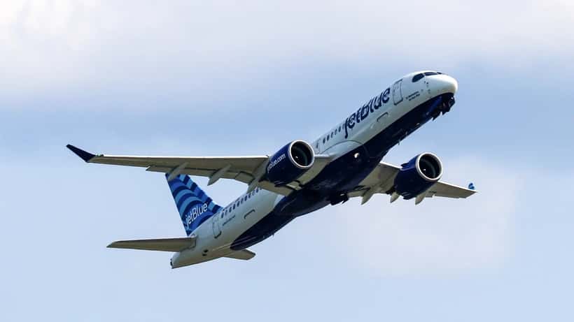 JetBlue A220-300 aircraft departing Boston Logan International Airport