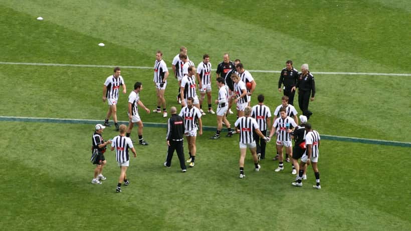AFL match between Collingwood and Carlton at a packed stadium