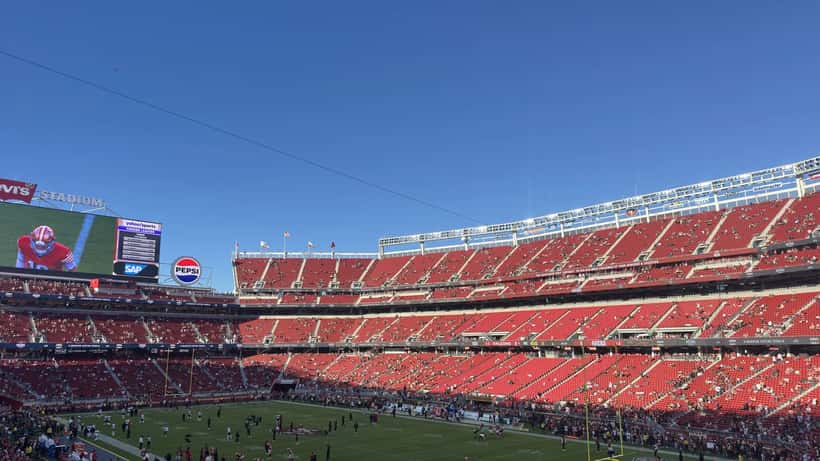 San Francisco 49ers players on the field at Levi's Stadium during an NFL game in 2025