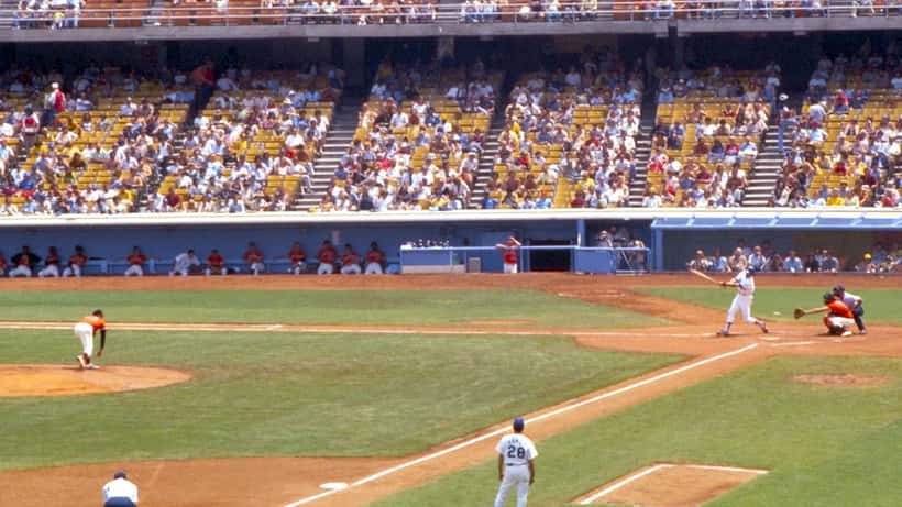 Dodgers vs Giants baseball game at stadium, classic rivalry matchup