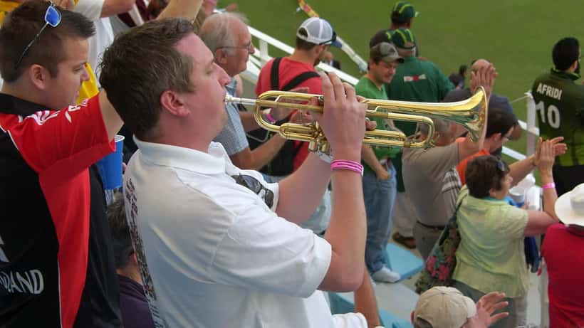 England cricket fan with trumpet cheering at a Test match