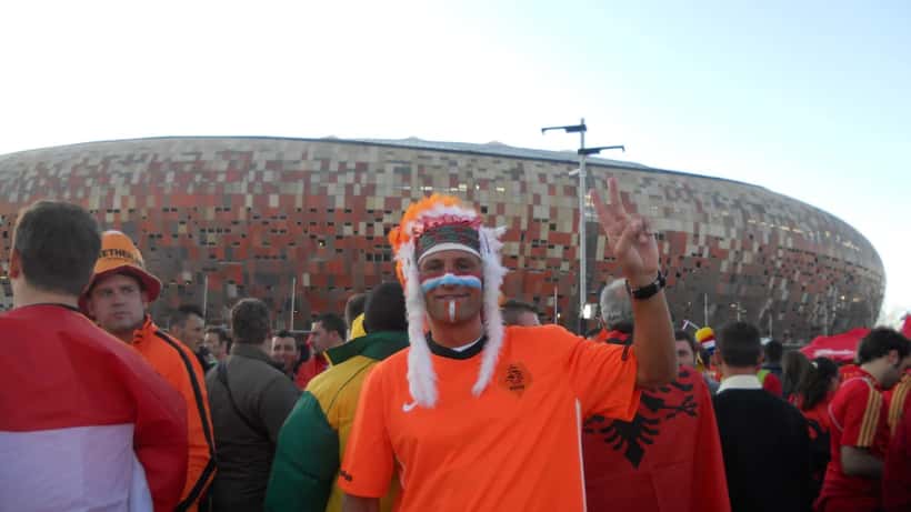 Soccer fan cheering outside stadium at World Cup 2026 in the United States