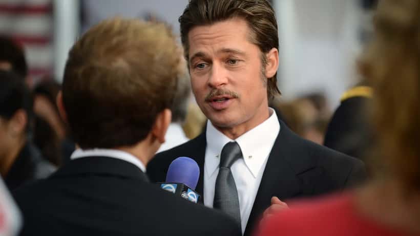 Brad Pitt bei einem offiziellen Auftritt – Hintergrund für Artikel über Immobilienrecht bei Trennung