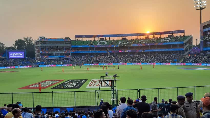 Cricket players on the field during an international match, illustrating IPL contract and injury insurance issues