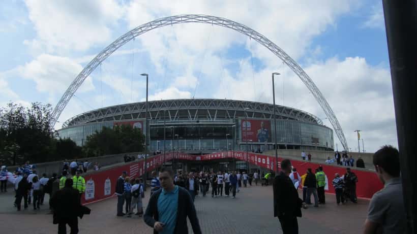 Wembley Stadium exterior viewed from Wembley Walk, venue of the 2026 FA Cup semi-final