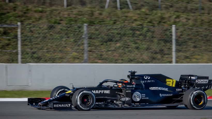 Esteban Ocon in F1 race suit during pre-season testing, representing sports contract law