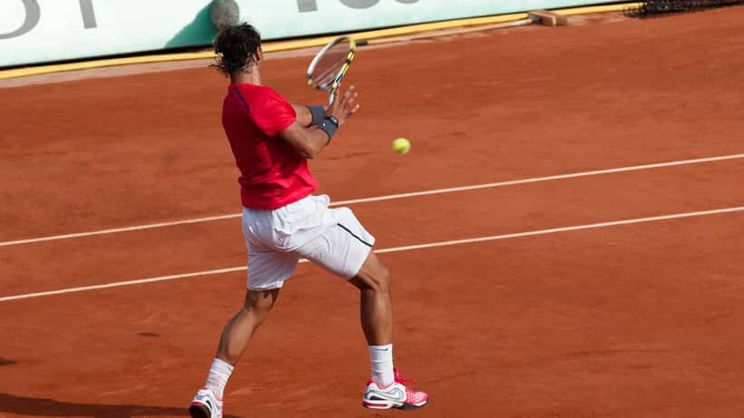 Joueur de tennis sur terre battue lors d'un tournoi international, Rome 2026