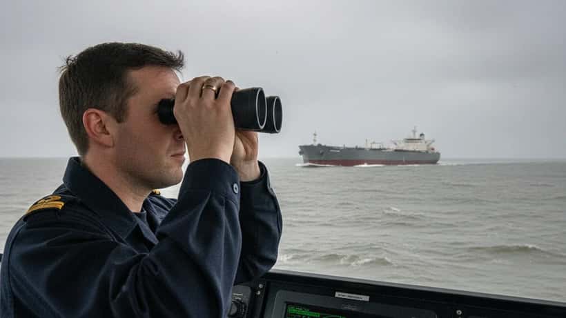 Royal Navy patrol vessel monitoring Russian tanker in the English Channel