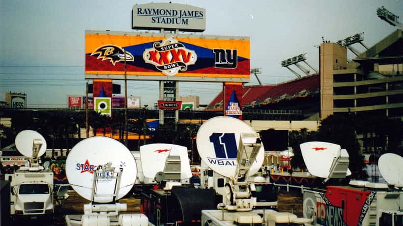 Super Bowl broadcast compound with media trucks and satellite equipment